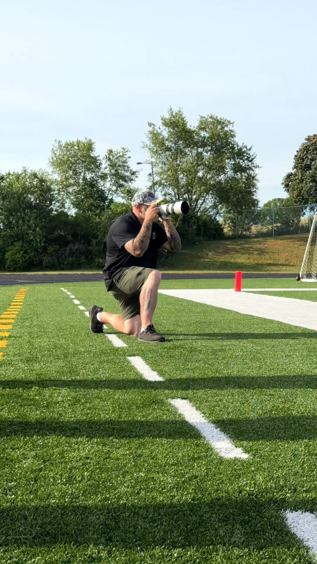 Richard Rowland Taking Image on Football Field